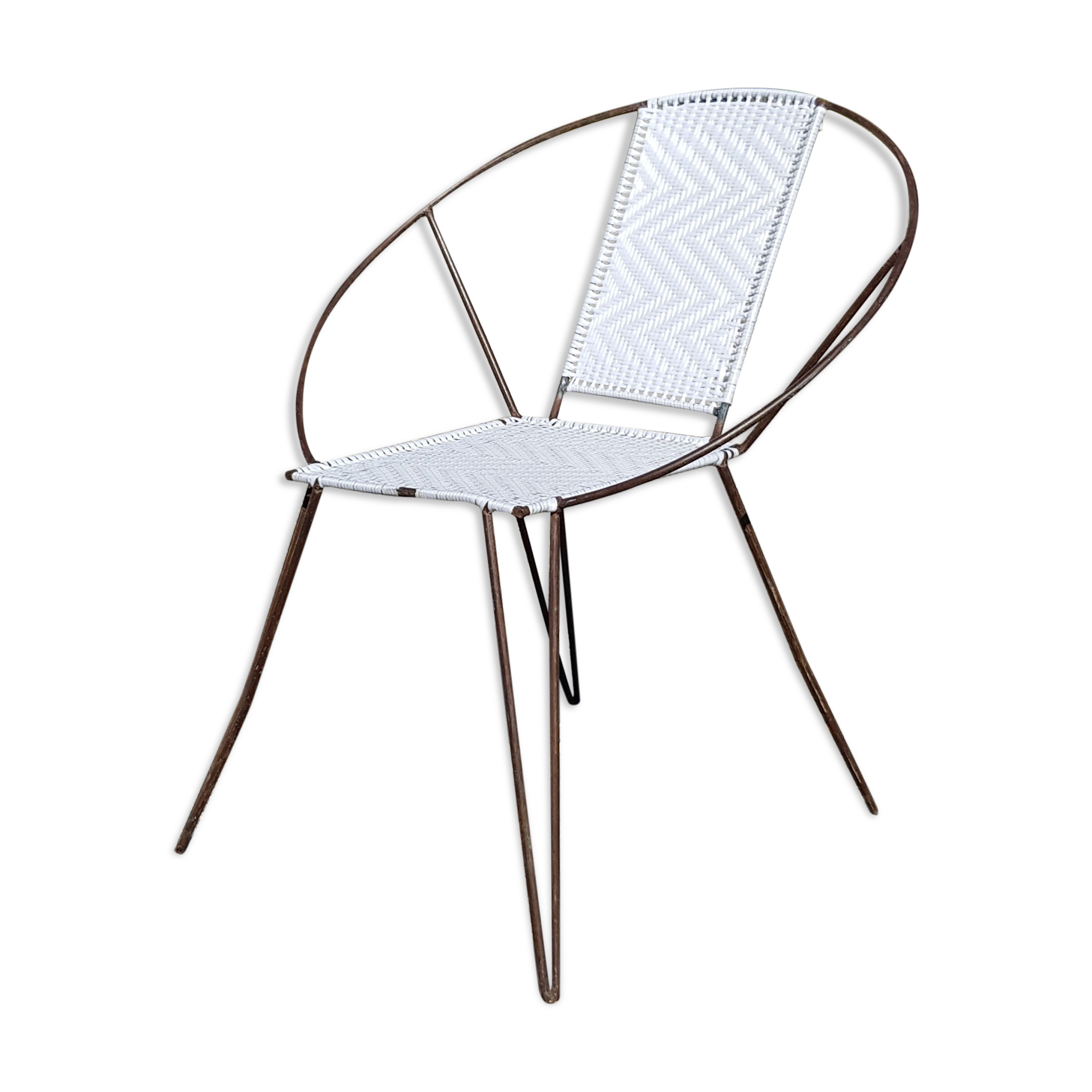 Vintage armchair in black metal and white plastic caning.