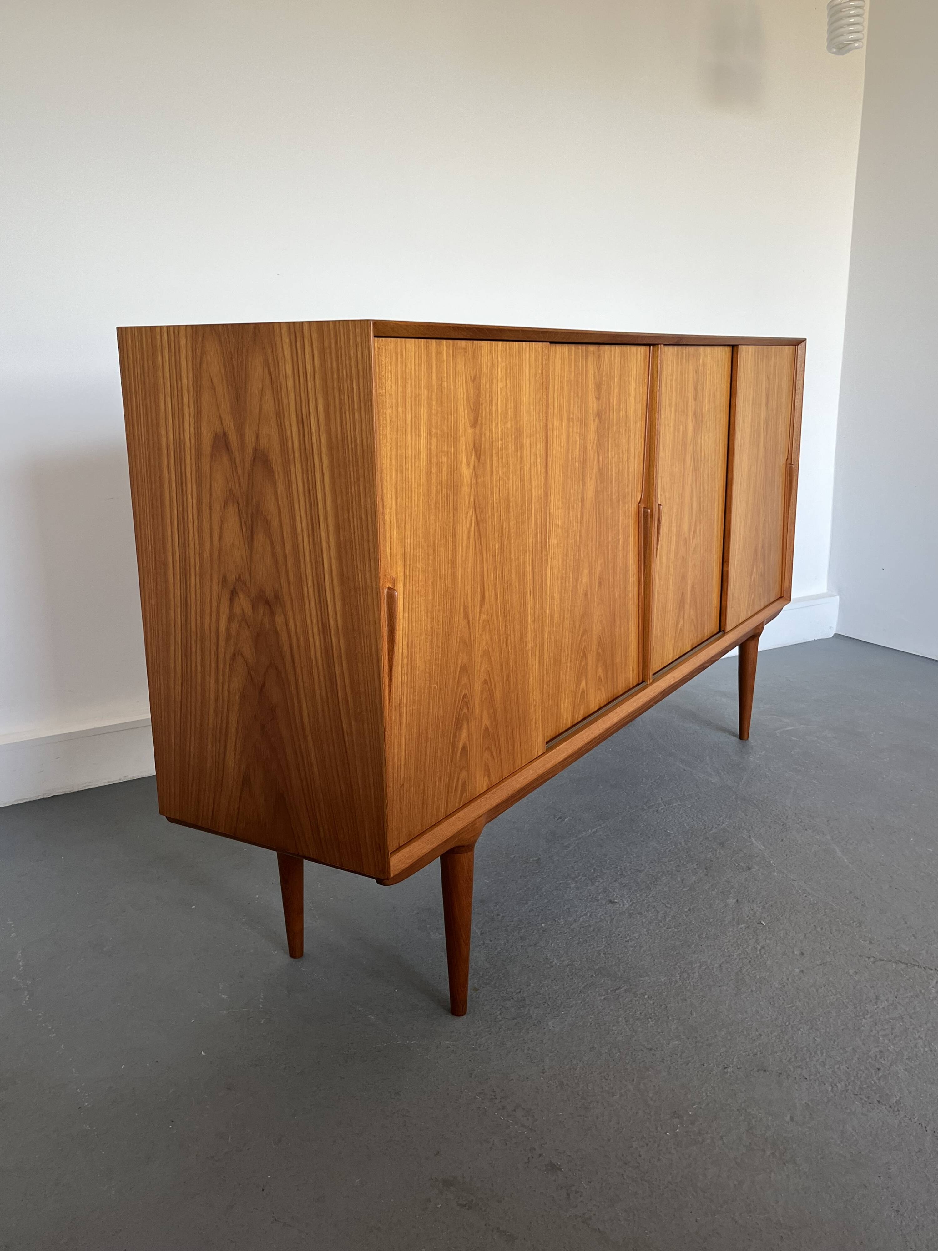 Model 19 High Sideboard in Teak with Sliding Doors by Gunni Omann for Omann Jun, 1960s