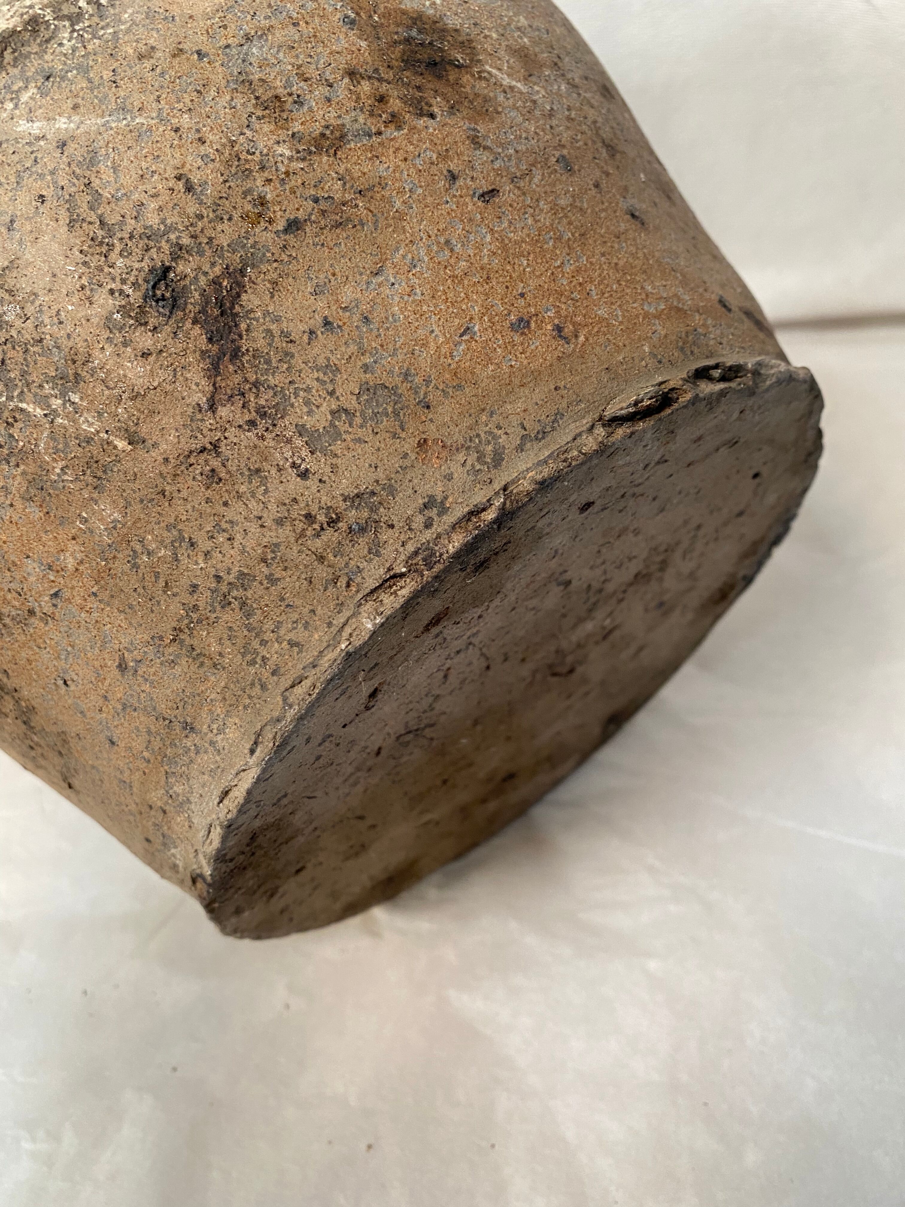 Vase jug in ancient sandstone