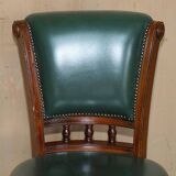 Modern captain's chair in leather, beech frame, adjustable.