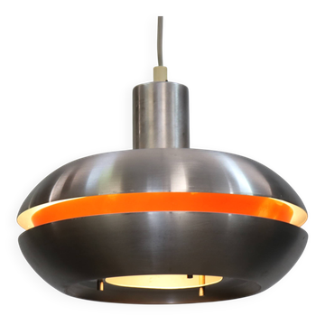 Old Danish space age design lamp in alu and orange inside.