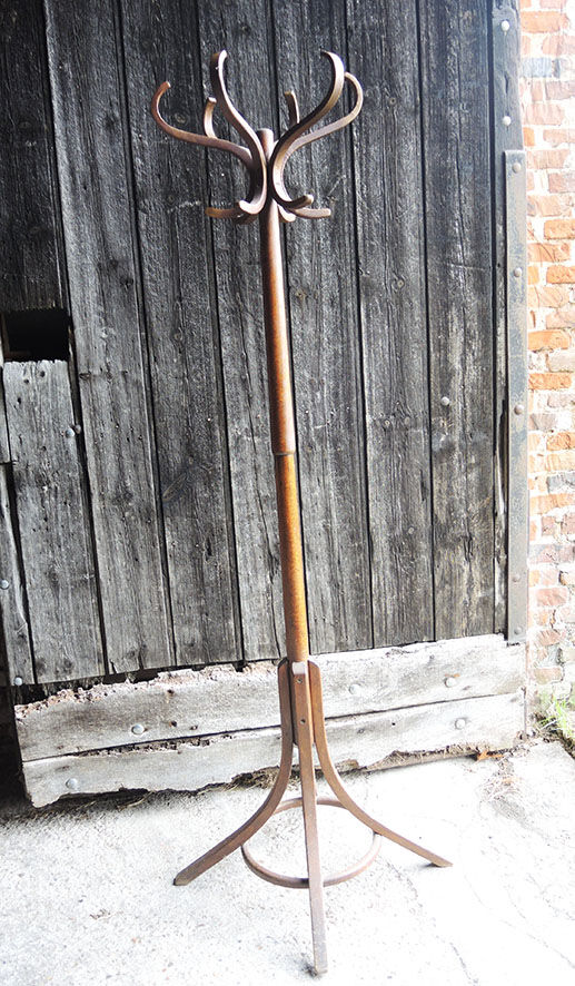 Old wooden parrot coat rack