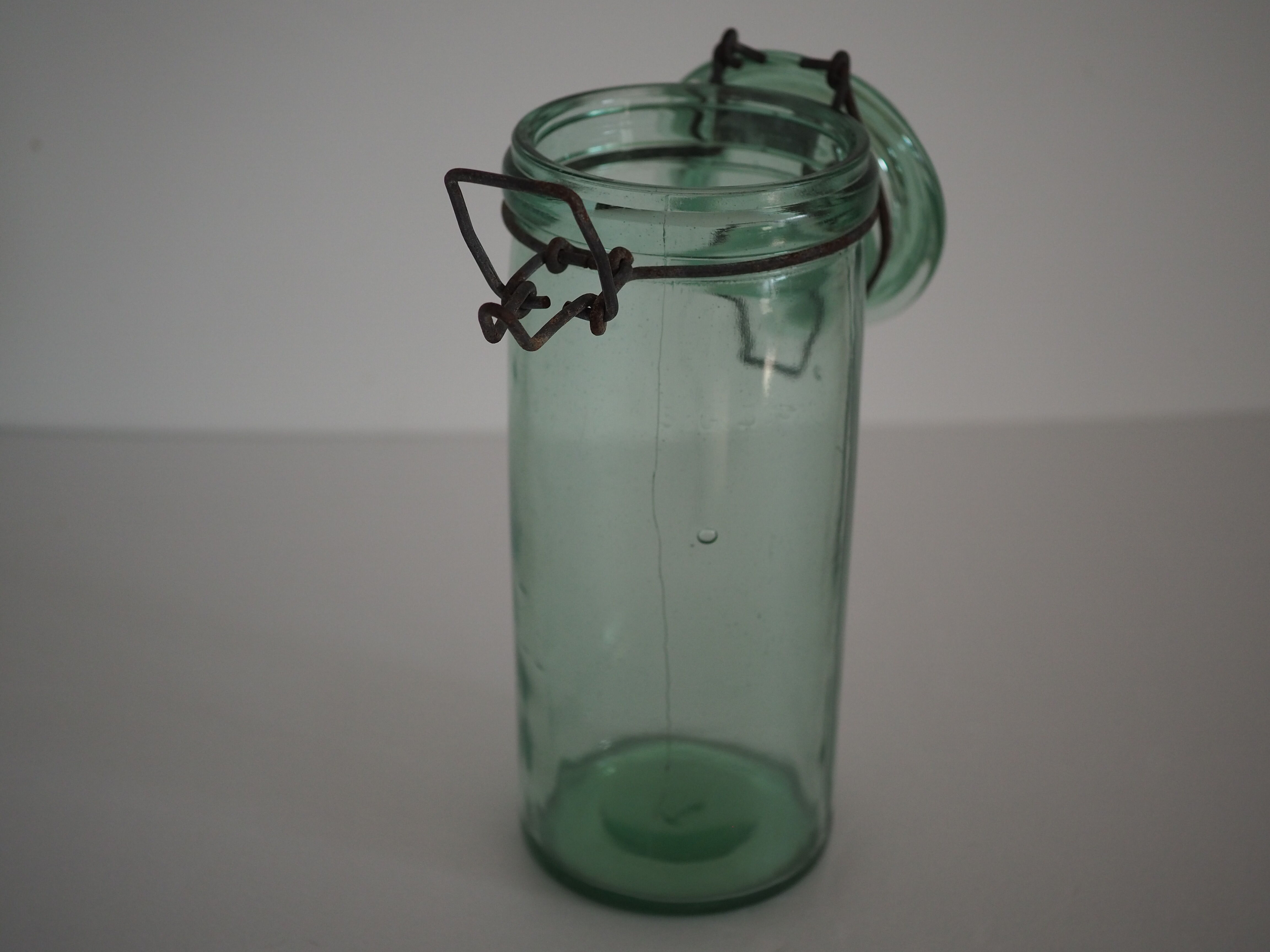Green "ideale" glass canning jar