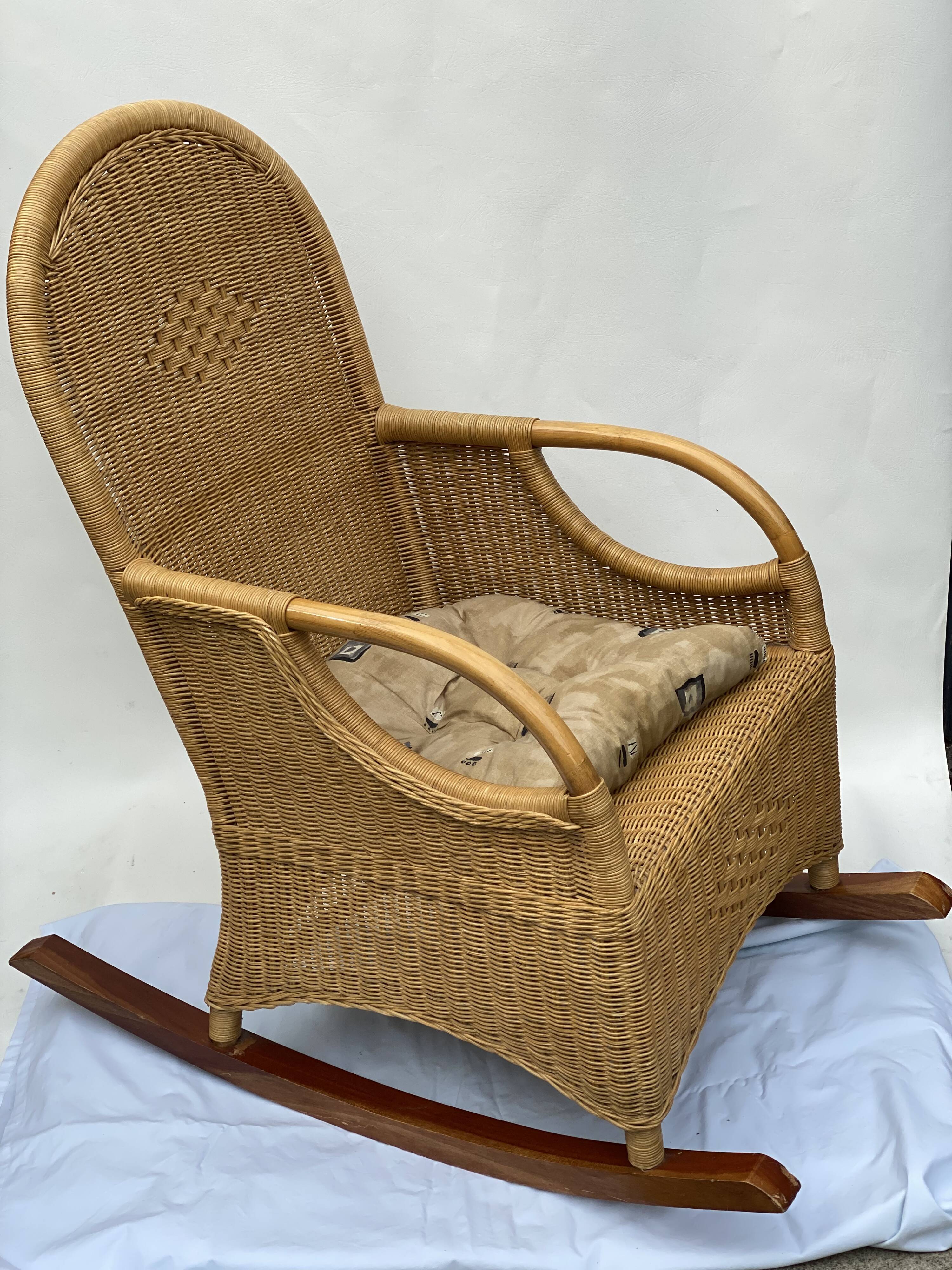 Vintage rotan and teak rocking chair