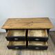Low commode in pine and dark grey patina from the early 20th century.