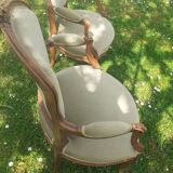 Pair of Rocaille style armchairs in green fabric and walnut, 19th century