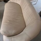 2 seater leather sofa in off-white with a rounded shape