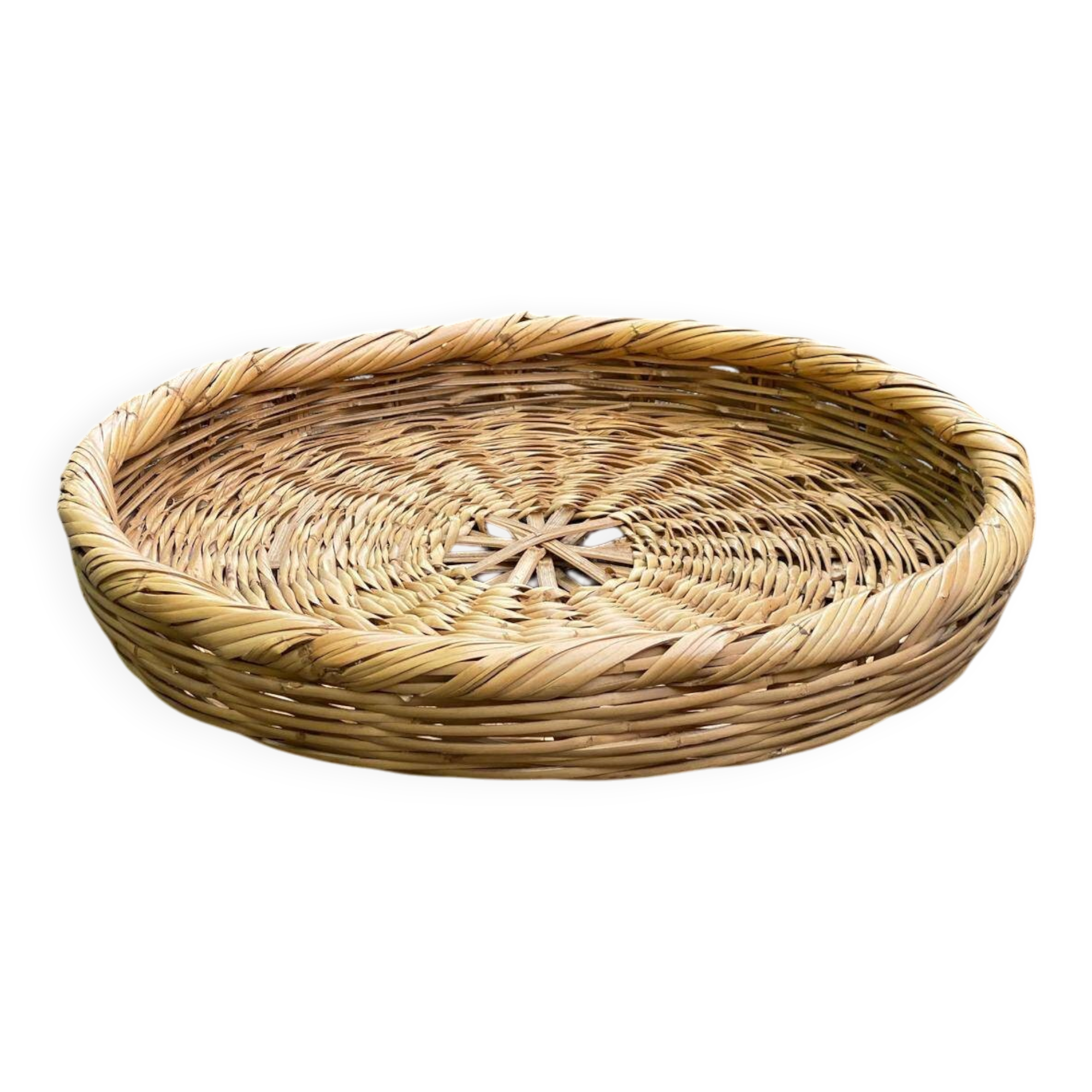 Round basket woven from straw