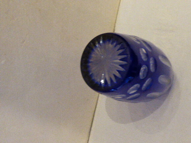 Blue and transparent glass vase, has vintage geometry patterns