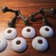 Antique pair of bronze and alabaster 3-arm wall lights, 1910