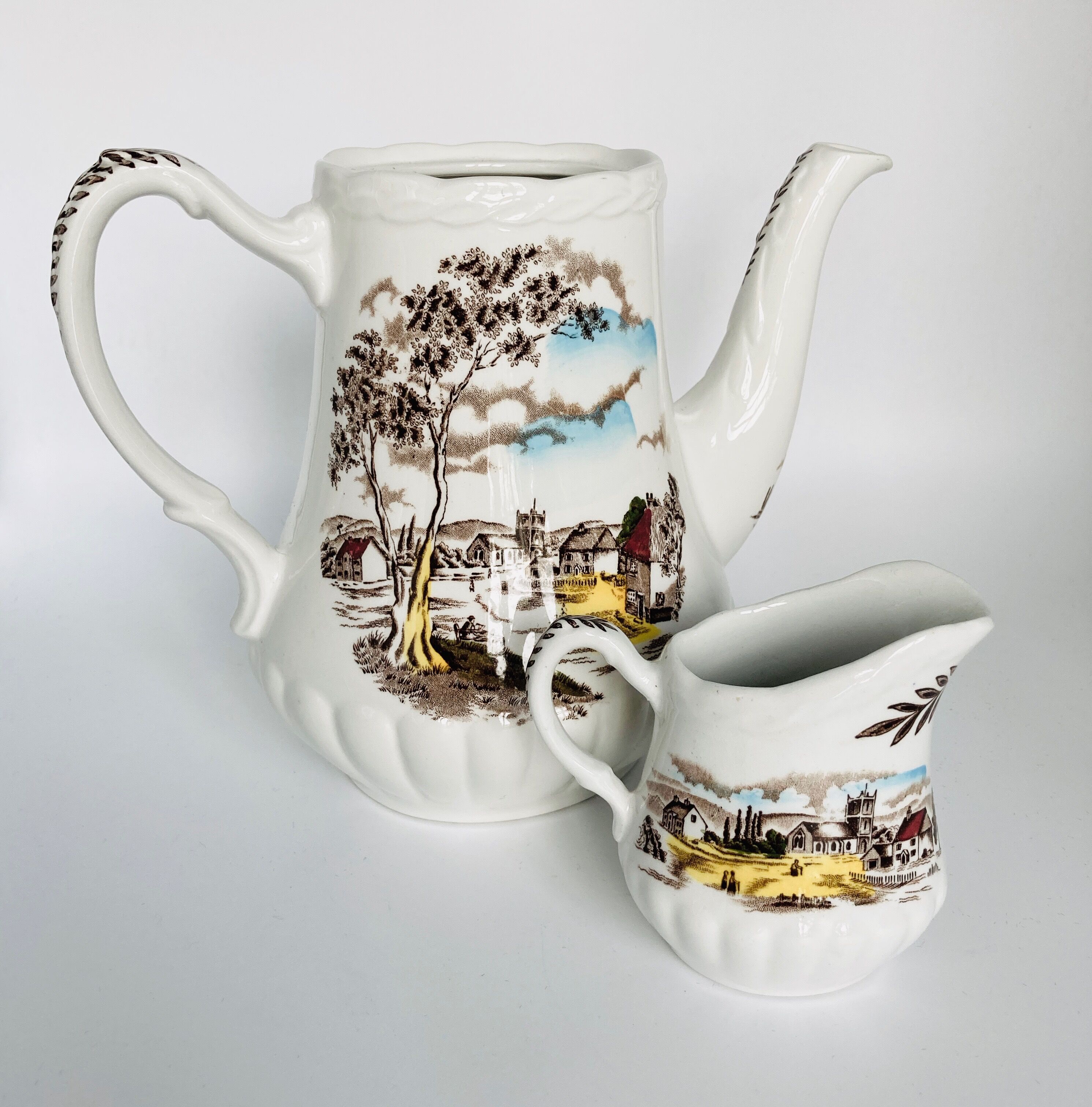 English earthenware cafeteria and its milk pot