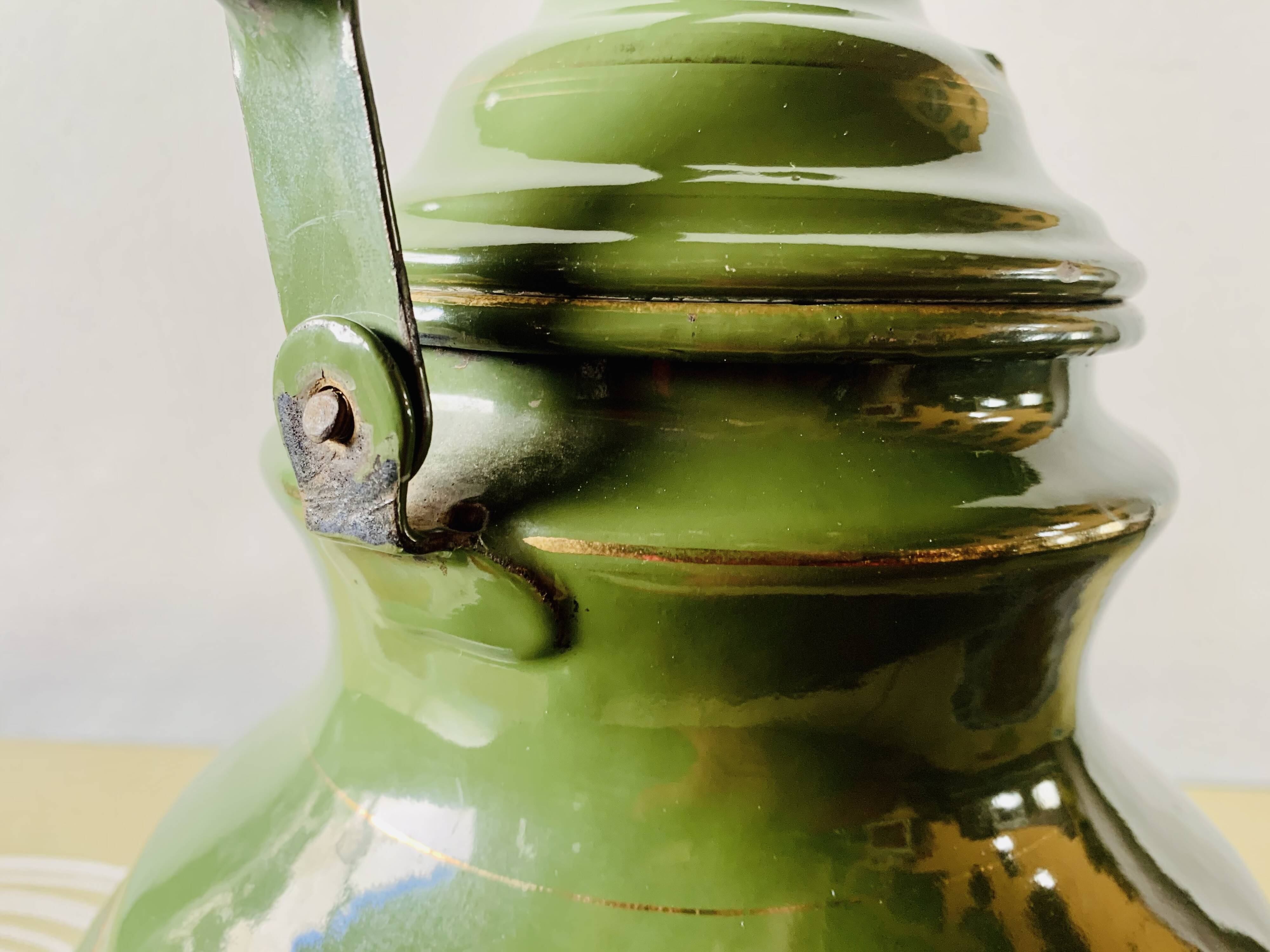 Vintage green enameled sheet metal kettle