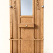 Art Deco wardrobe in carved solid oak with bevelled mirror, 1930.