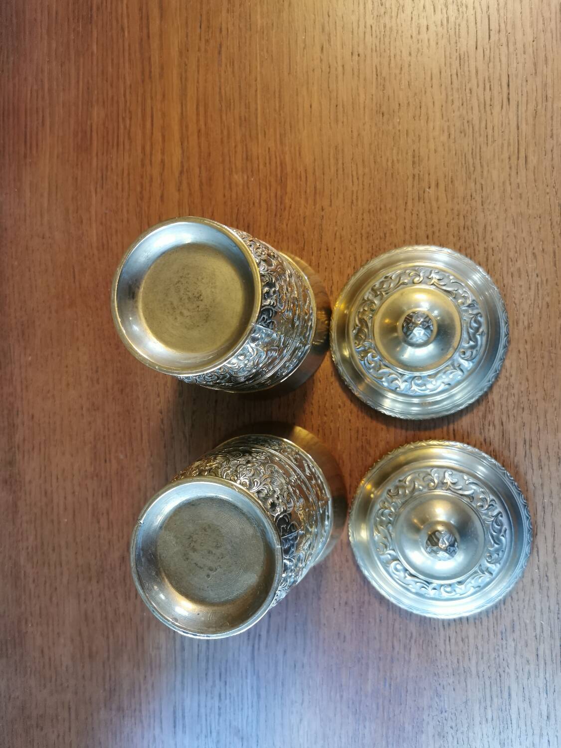 Pair of antique chiseled metal candy boxes