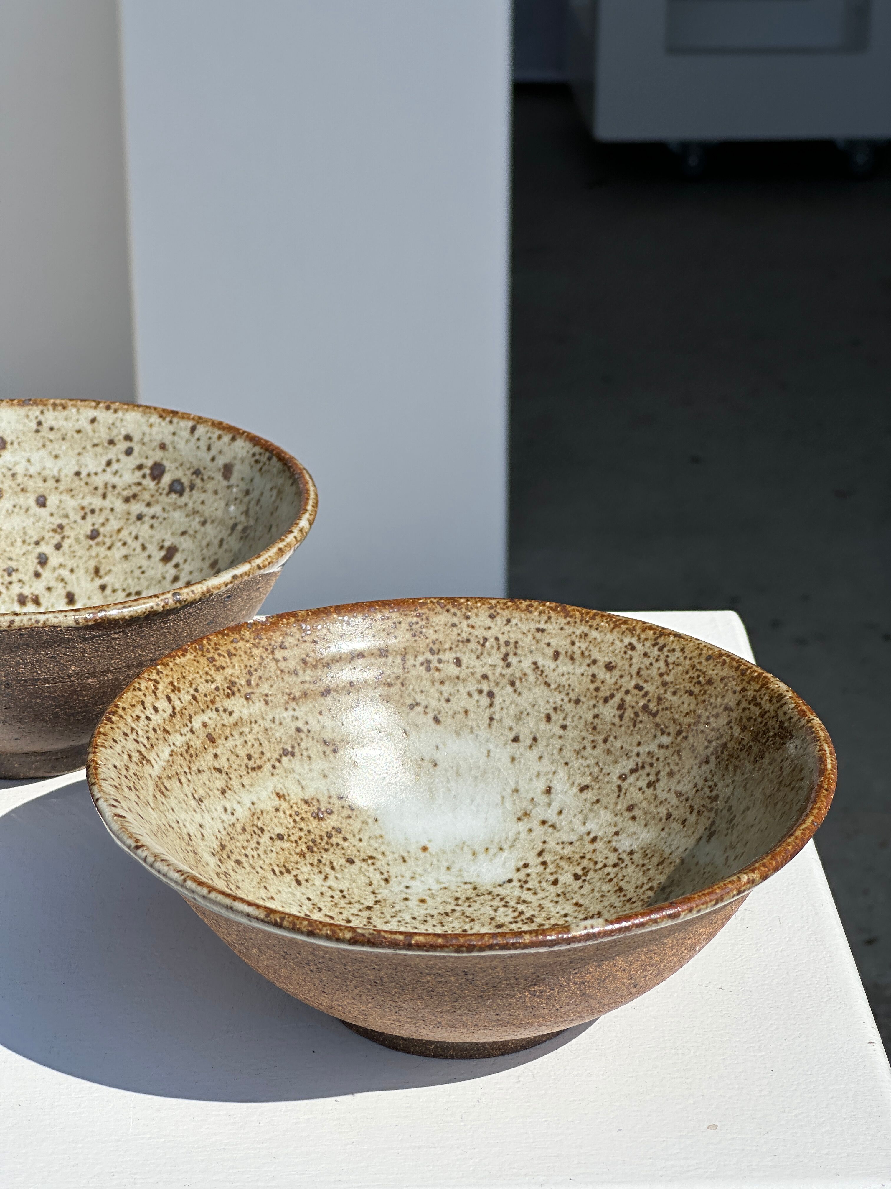 Duo of ceramic bowls interior glazed exterior matt raw earth