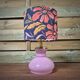 Table lamp, pink glass globe base, floral shade