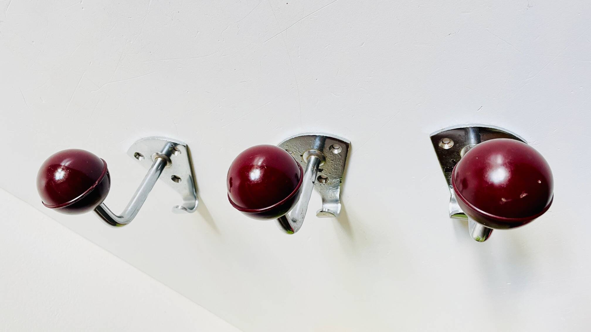 Chrome and bakelite coat hooks from the 70s