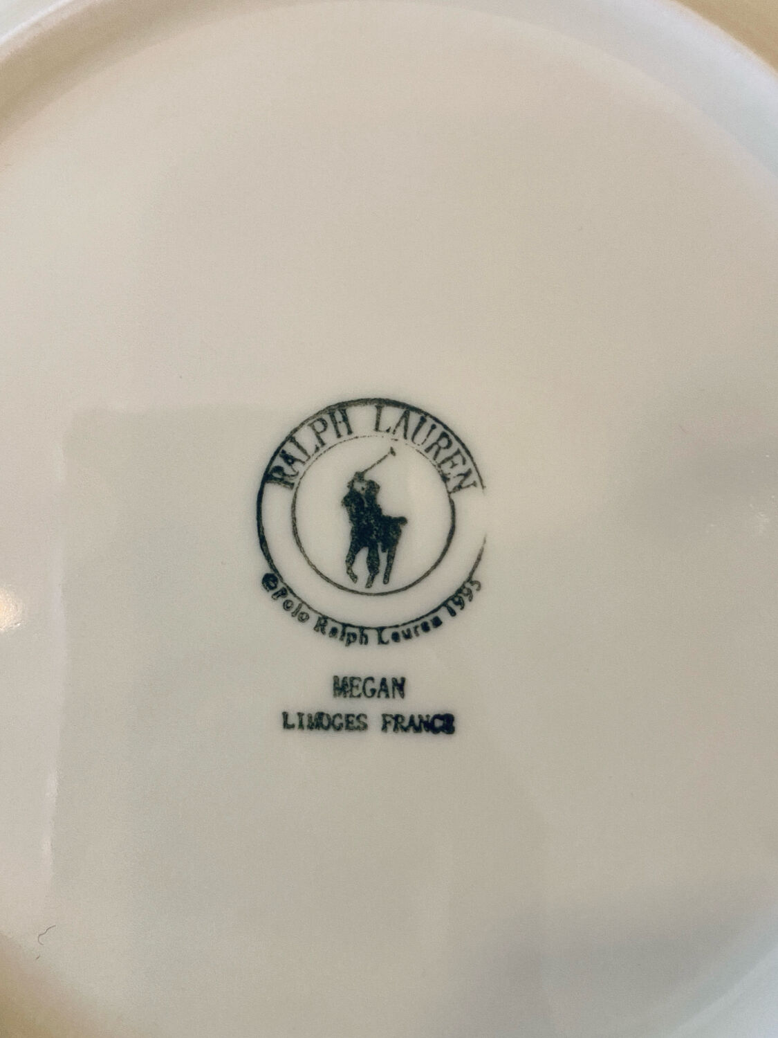 Lot of 6 Limoges plates and Ralph Lauren model Megan.