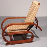 An exceptionally rare mahogany recliner crafted in Italy during the 1950s"