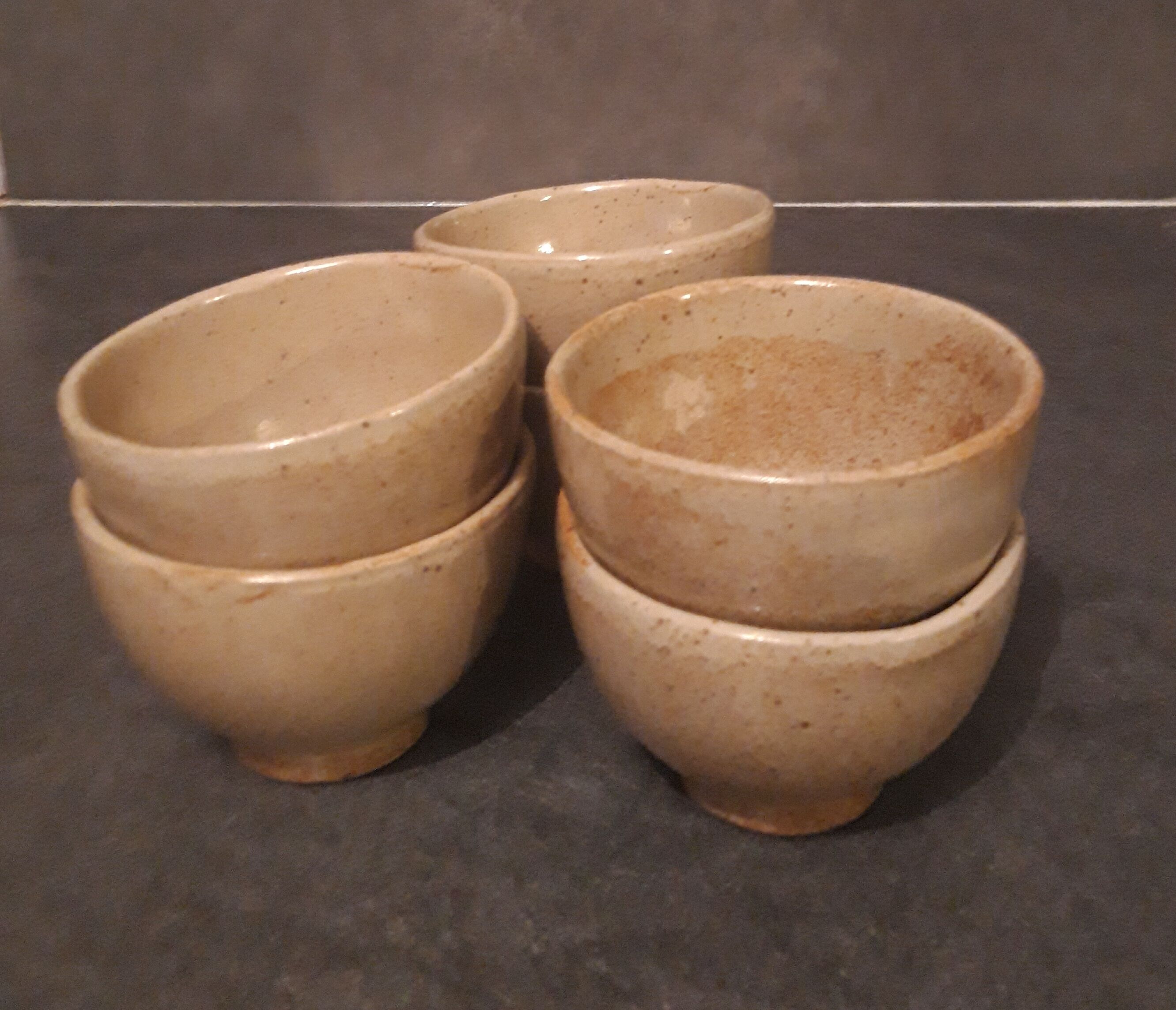 Suite of 6 sandstone cups
