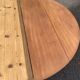 Round extendable banquet table stripped in solid mahogany with 4 extensions, 19th century.