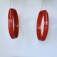 Pair of vintage round red plastic mirrors