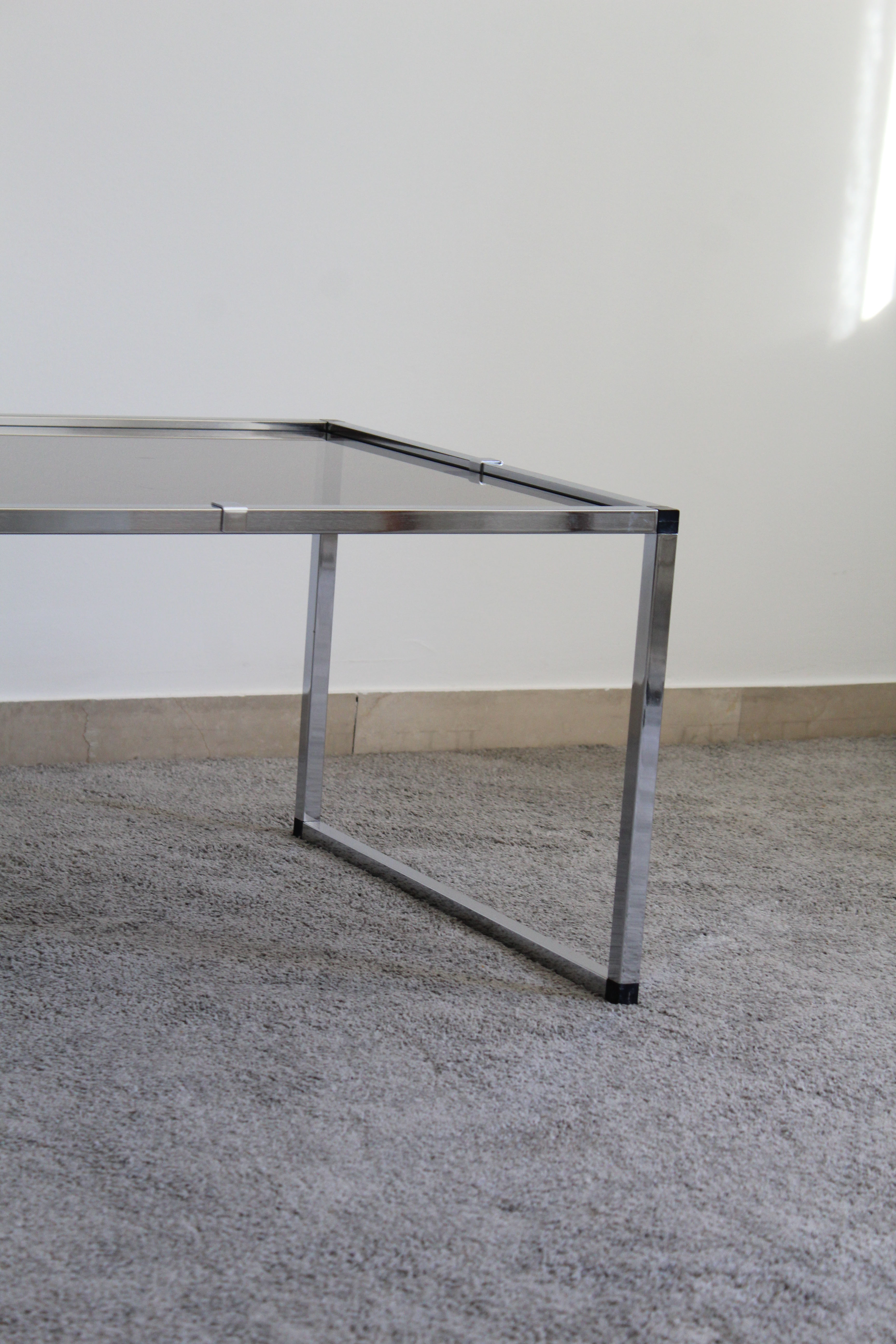 Pair of Coffee Tables in chromed metal and smoked glass, Italy 70's