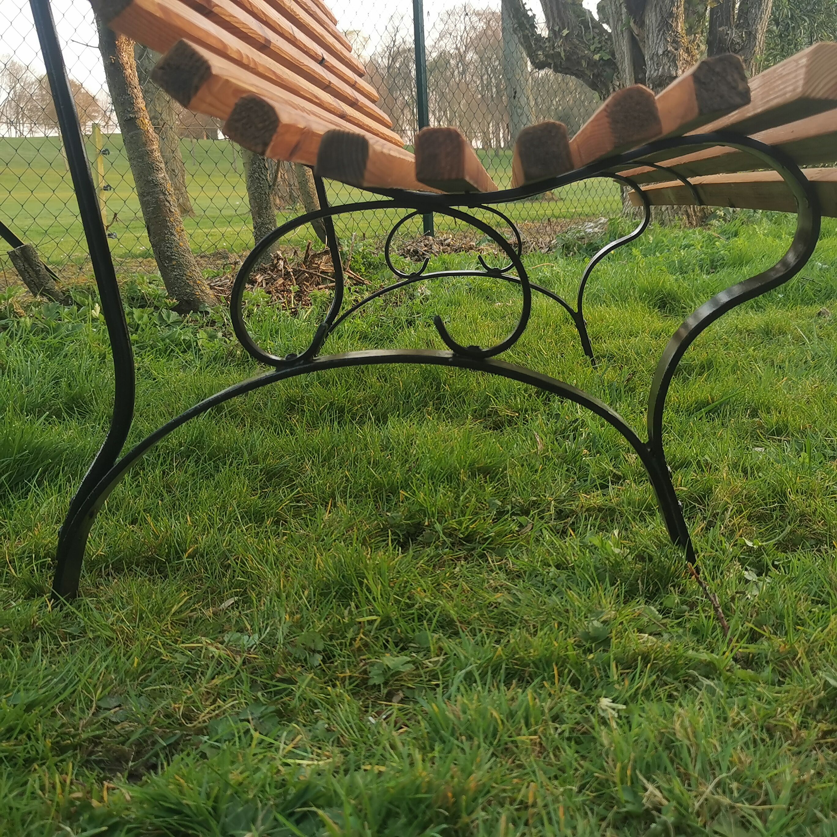 Metal and wood garden bench