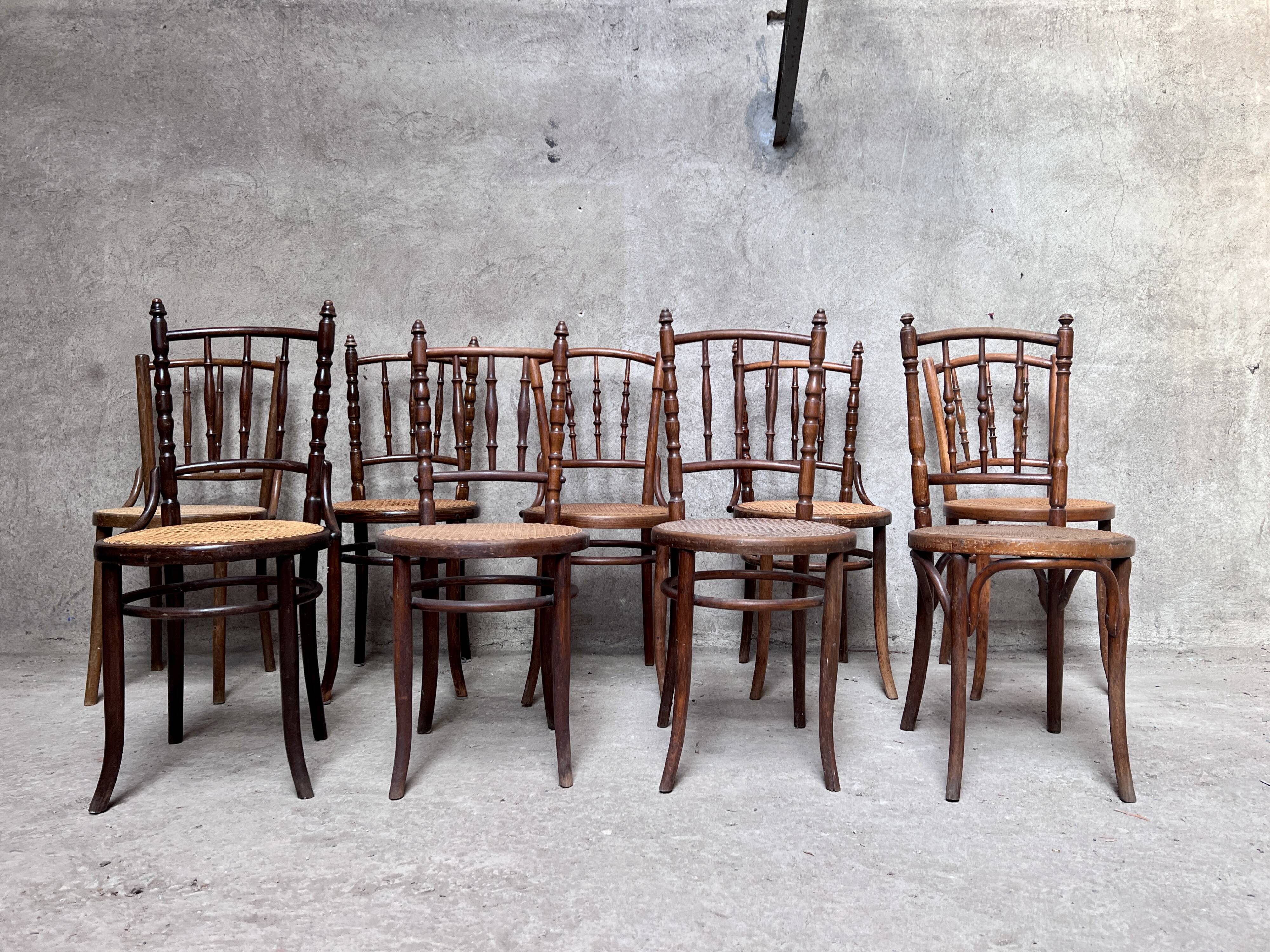 Series of 7 old bar cane cane bistro chairs