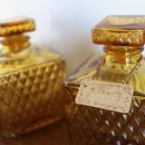 2 yellow glass whiskey carafes