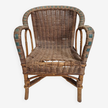Old vintage rattan children's armchair