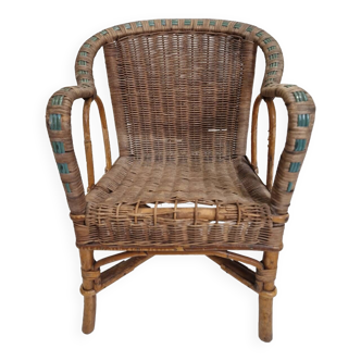 Old vintage rattan children's armchair