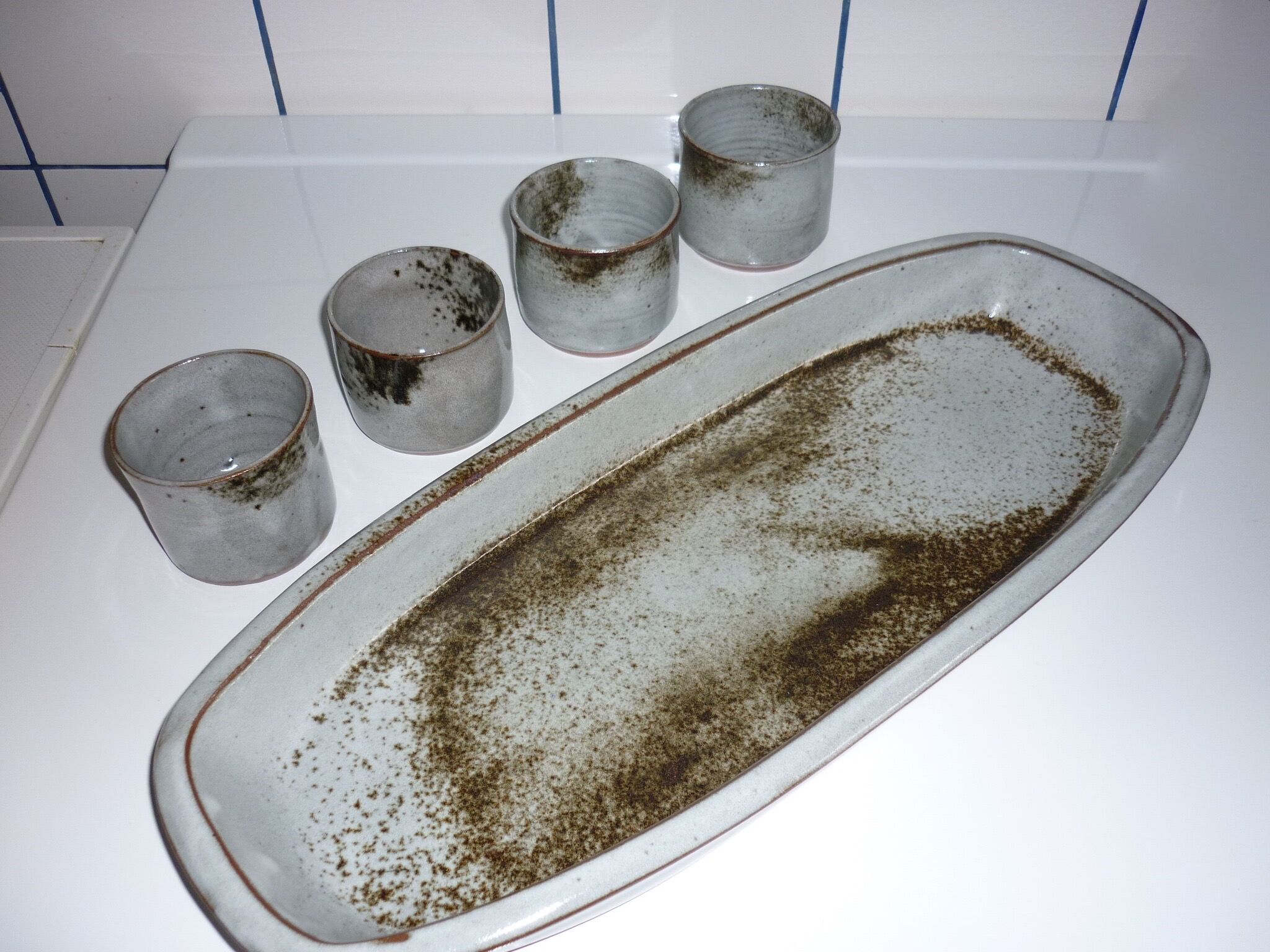 Ceramic fish dish and 4 pots for sauces from the 1960s