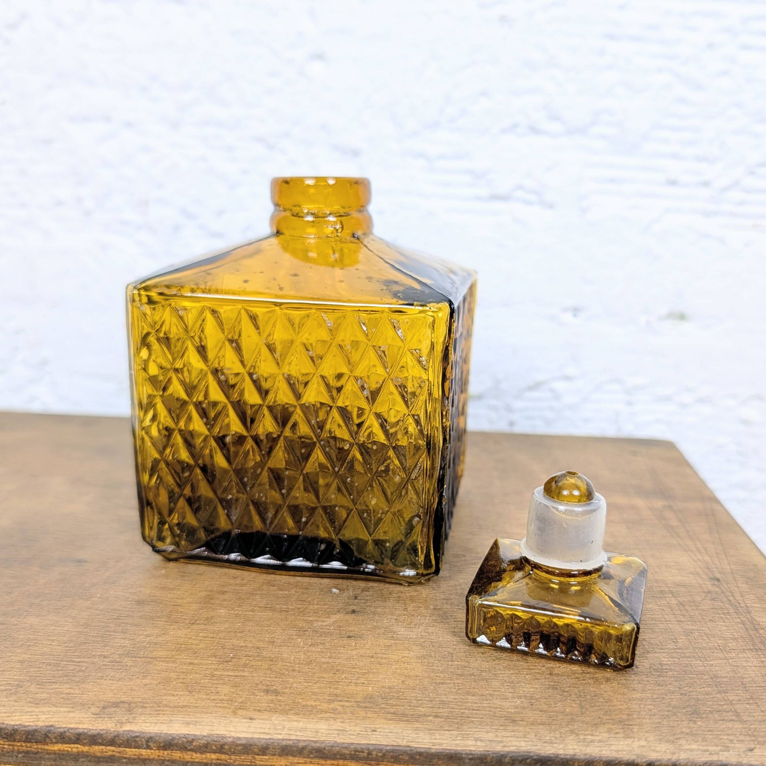 Amber glass liqueur carafe with diamond pattern