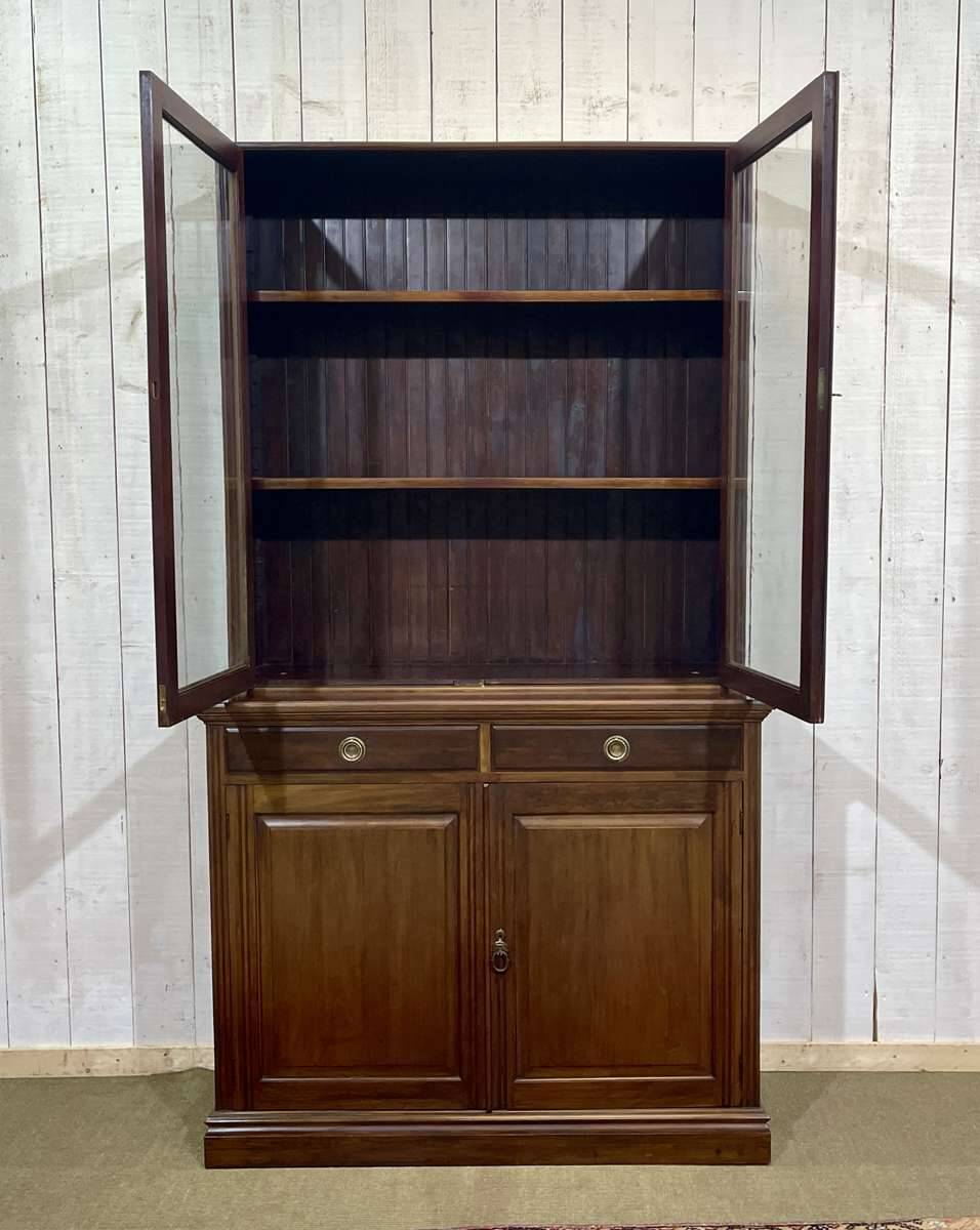 English walnut two-body library from the early 20th century.
