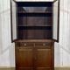 English walnut two-body library from the early 20th century.