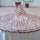 Vintage Asian hat braided palms and bamboo for decoration