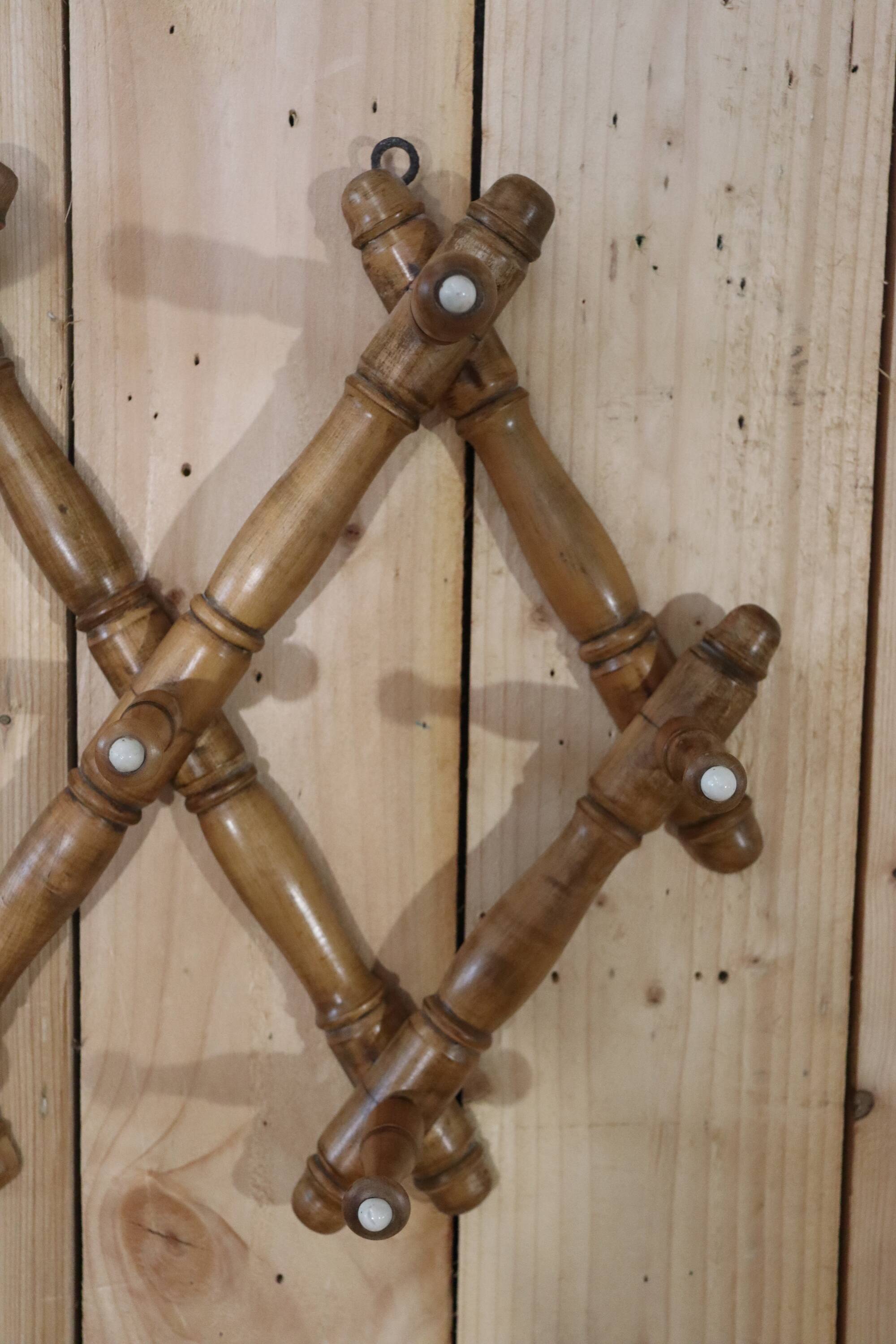 Old turned wooden wall coat rack
