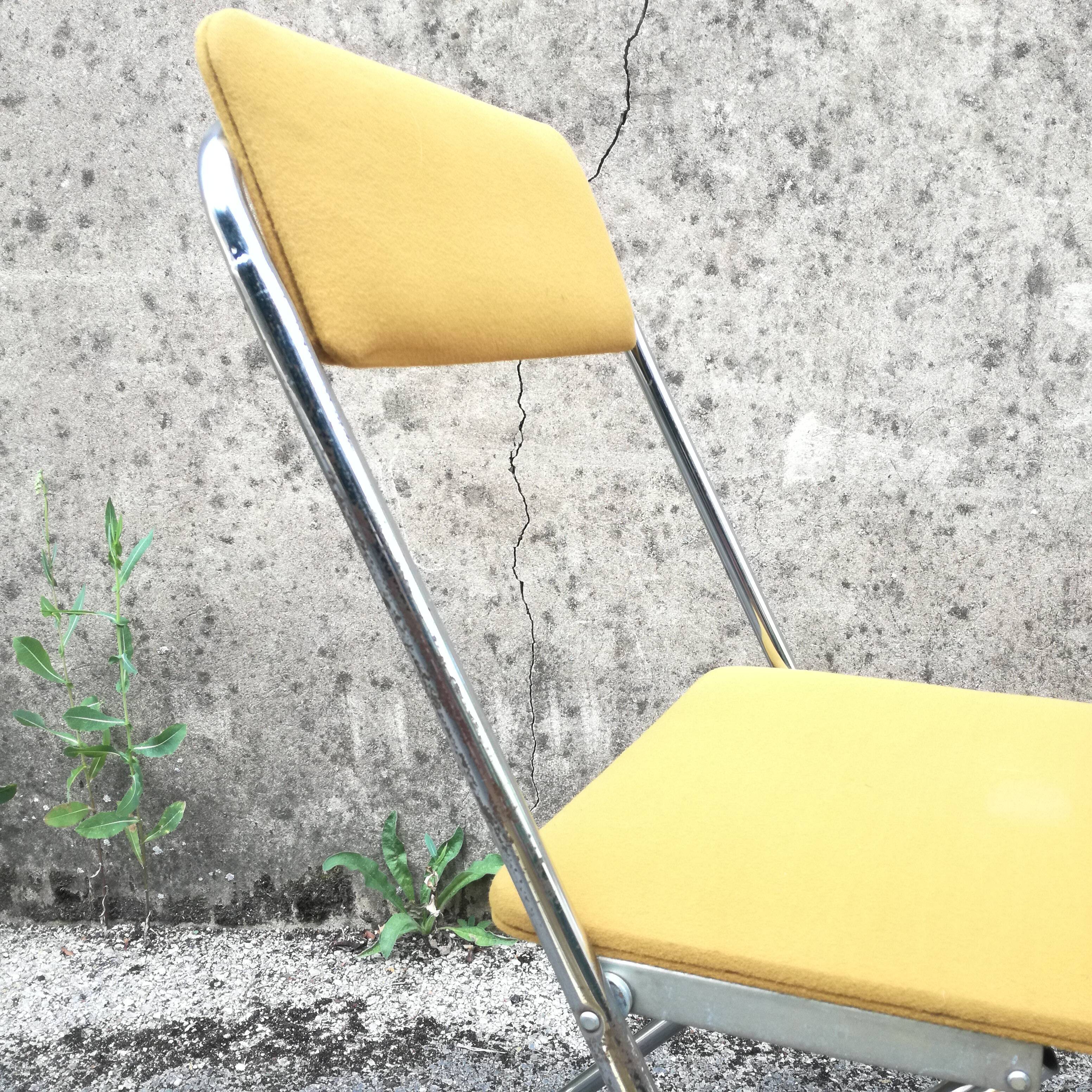 Yellow velvet folding chair