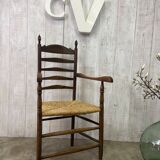 Old straw armchair
