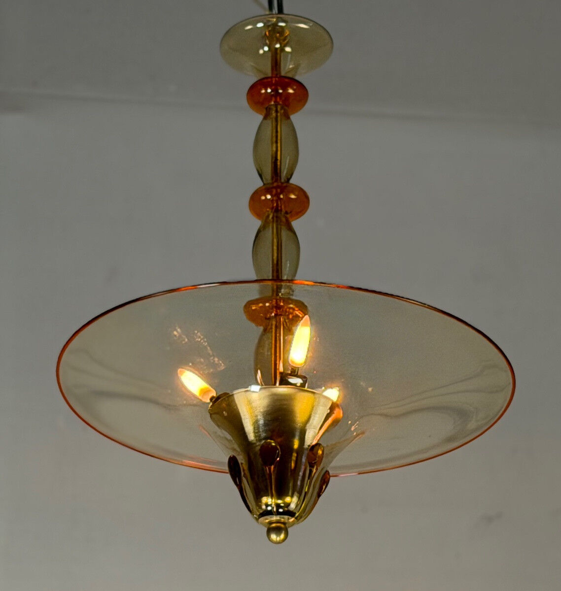 Venetian lustre in gilded and orange Murano glass, circa 1920.