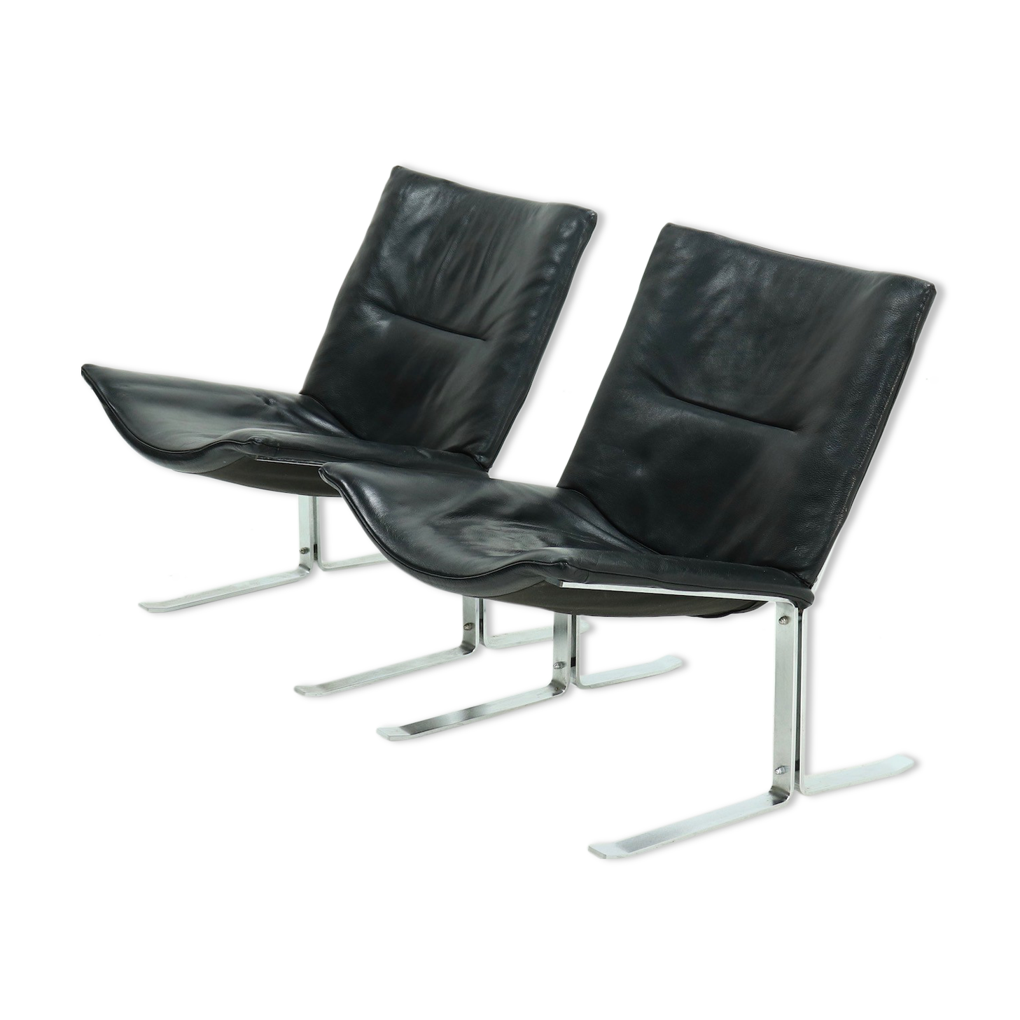 Set of 2 Danish lounge chairs by Kebe Møbler model Eagle with black leather.