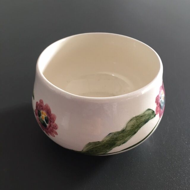 Empty pocket floral decoration signed