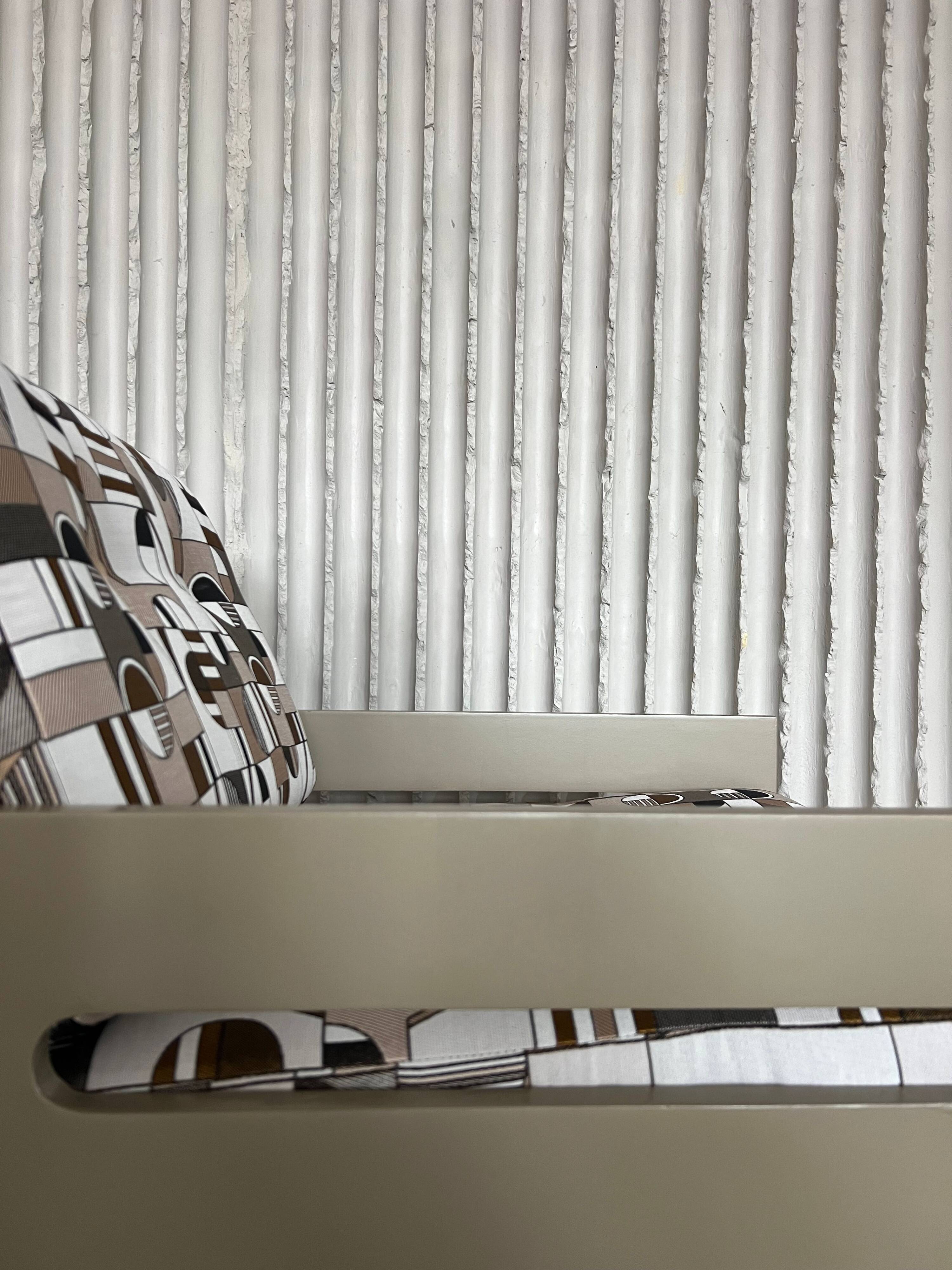 Vintage lounge chairs – newly upholstered in geometric fabric