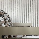 Vintage lounge chairs – newly upholstered in geometric fabric