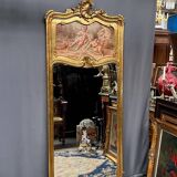 Antique rococo mirror with cupids