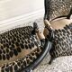 Restored Louis XV-style leopard convertible chairs