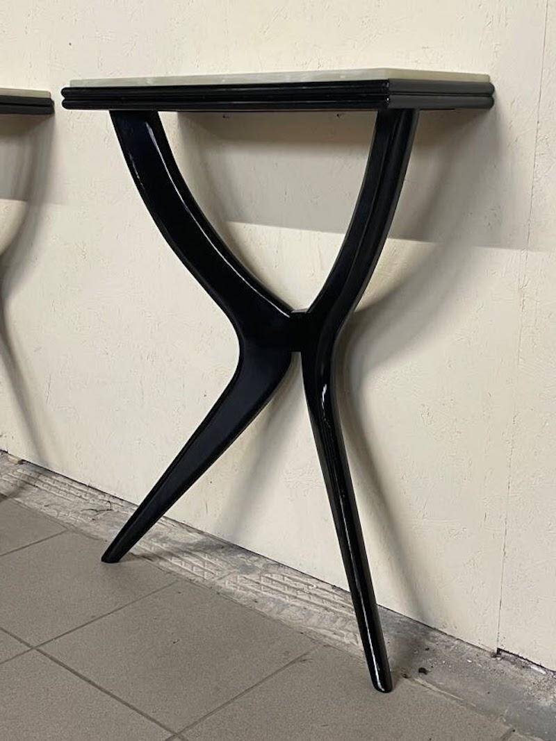 Console from the 1950s in ebonised wood and green marble.