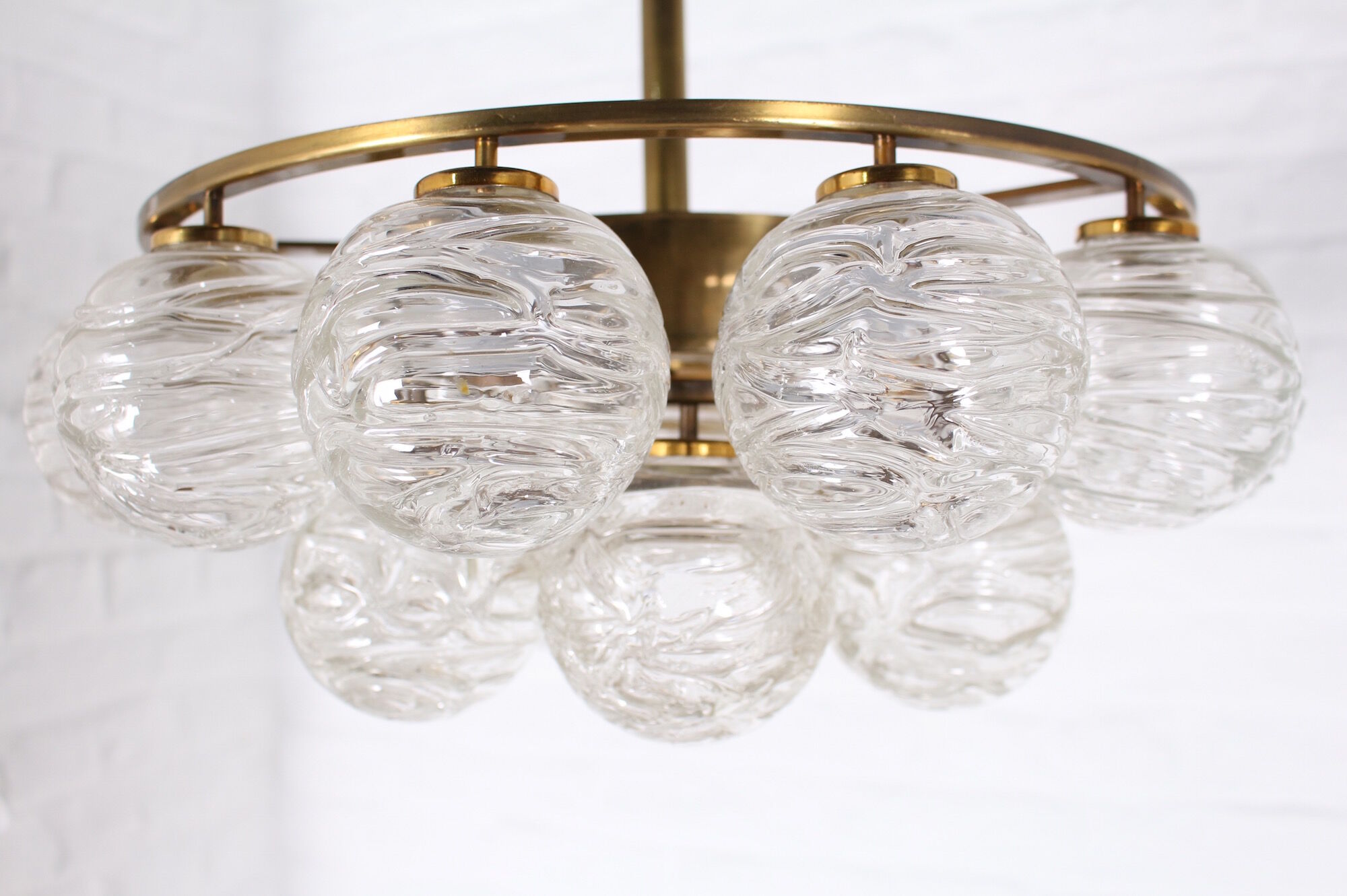 Brass chandelier and glass globes