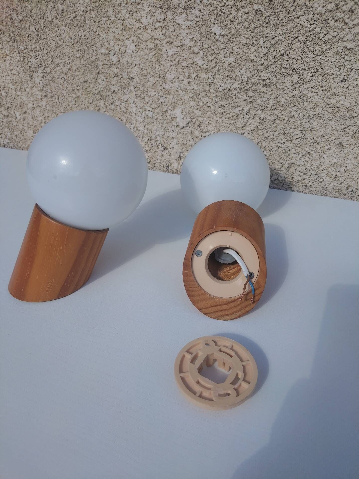 Pair of vintage wall lights in varnished pine and opal glass, 1970s-80s.